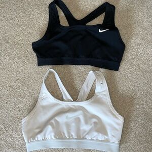Nike sports bras.  Size Medium